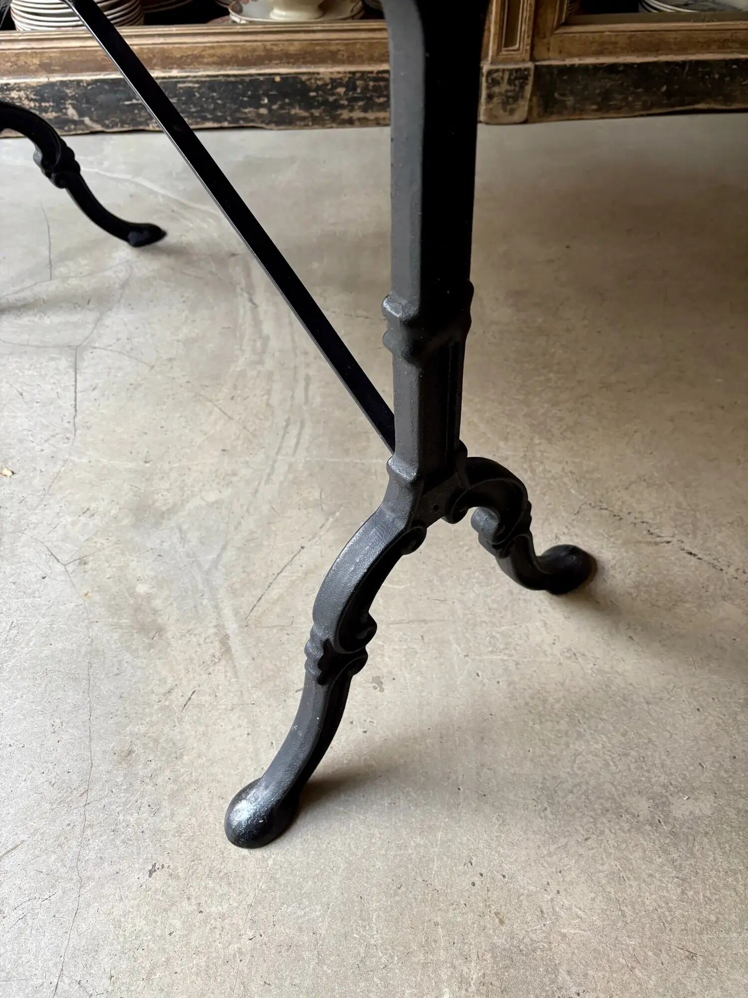 Oblong bistro table in Caunes stone and black cast iron, 120 x 60 cm