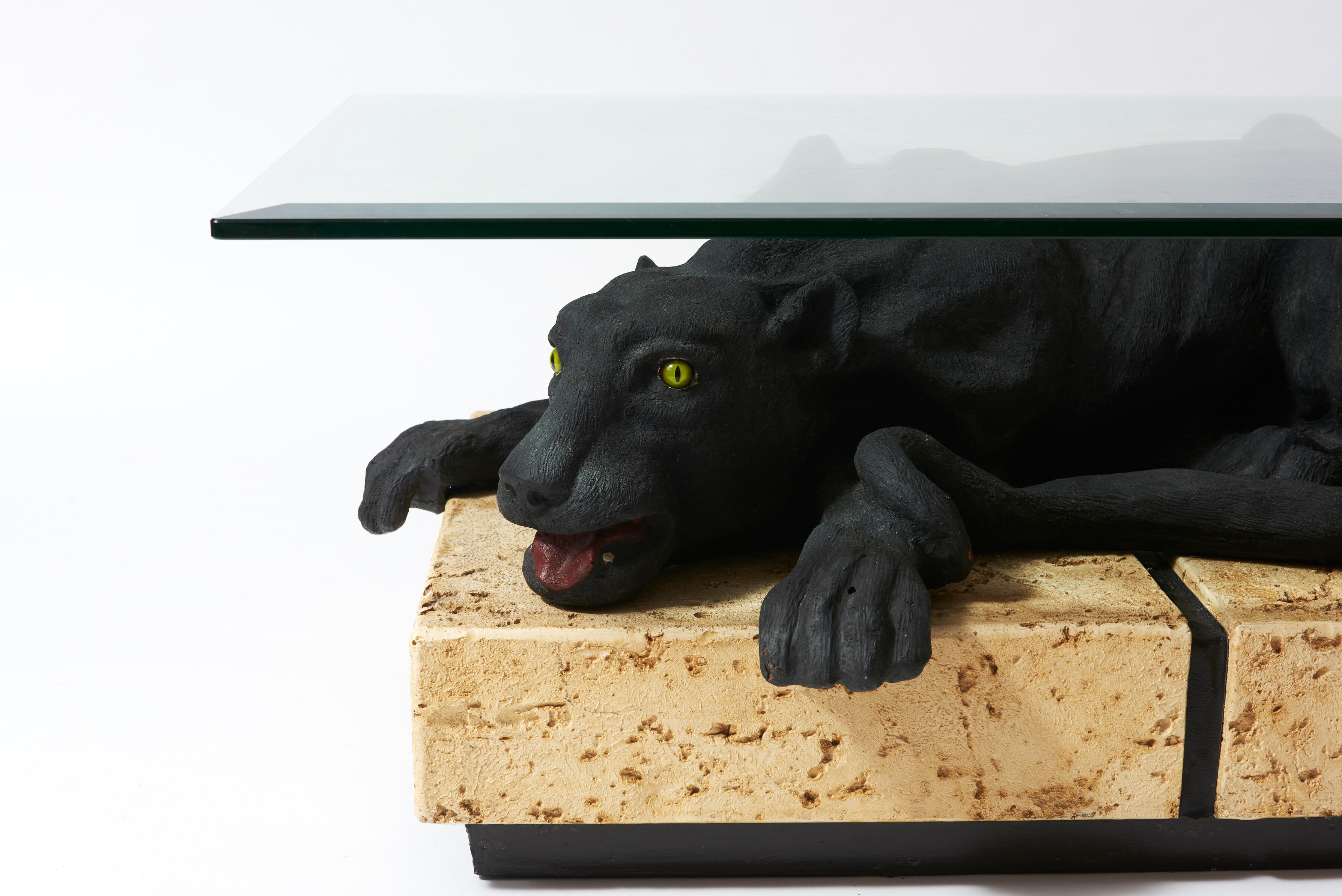 Panther coffee table on stone base and glass tablet