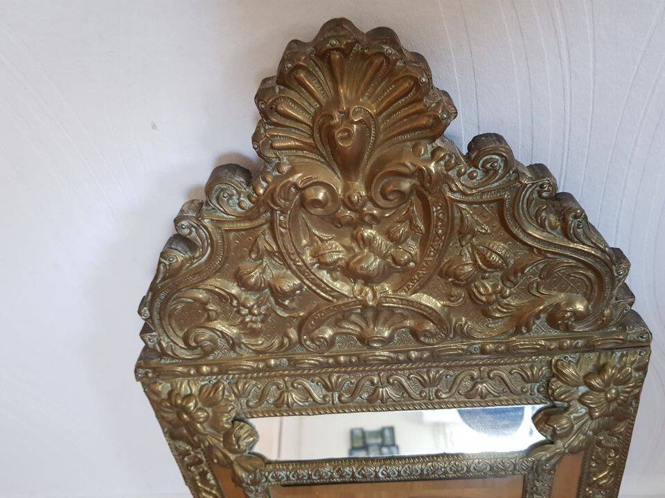 Old mirror with embossed brass beads, late 19th century