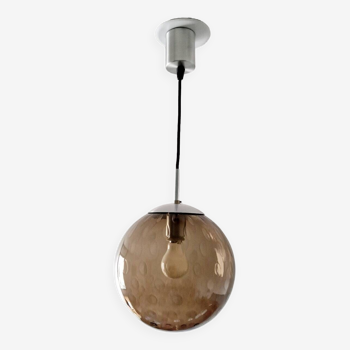 Smoked glass ball pendant light by Raak 1970