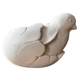 Chick in its egg, decorative plaster - empty pocket
