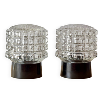 Old pair of molded glass and Bakelite wall or ceiling lights