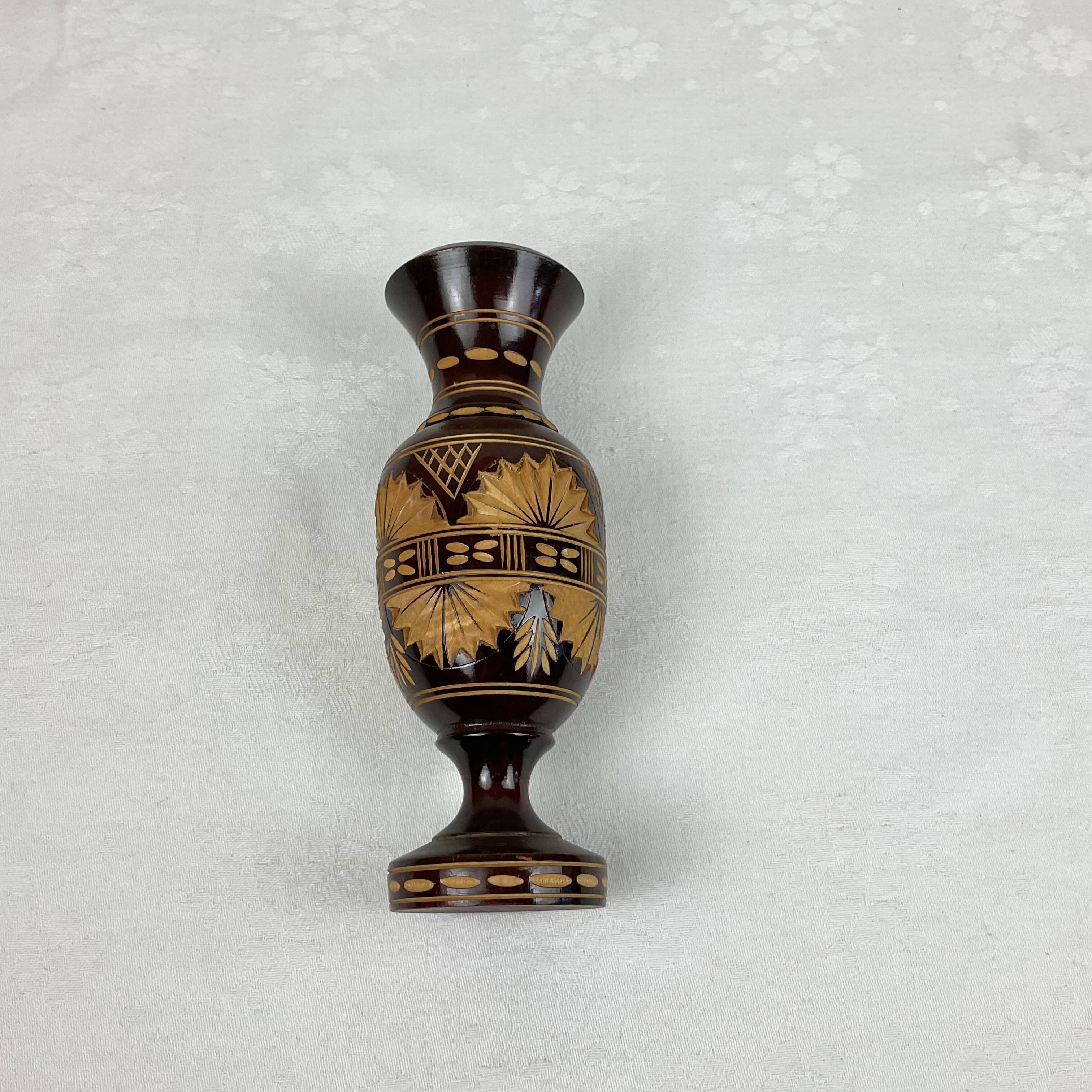 Carved wooden vase