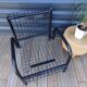 Duo de fauteuils noirs "grillage" en métal