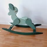 Cheval de bois à bascule