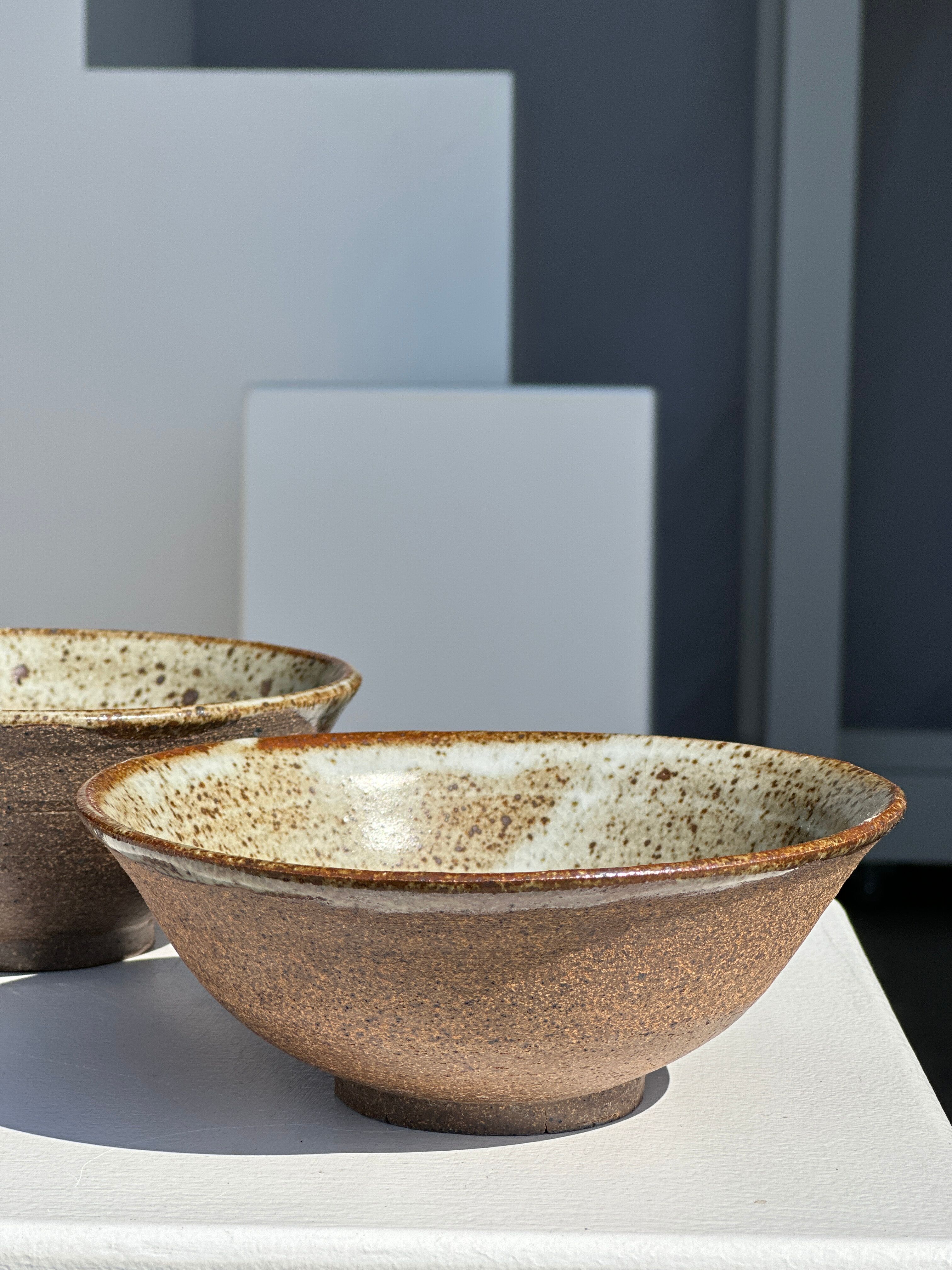 Duo of ceramic bowls interior glazed exterior matt raw earth