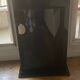 Curved black lacquered furniture signed assouline and dated 1987.