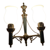 Brass wall sconce and frosted globe