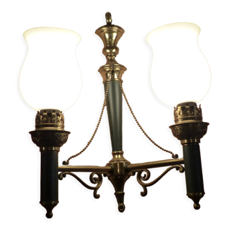 Brass wall sconce and frosted globe