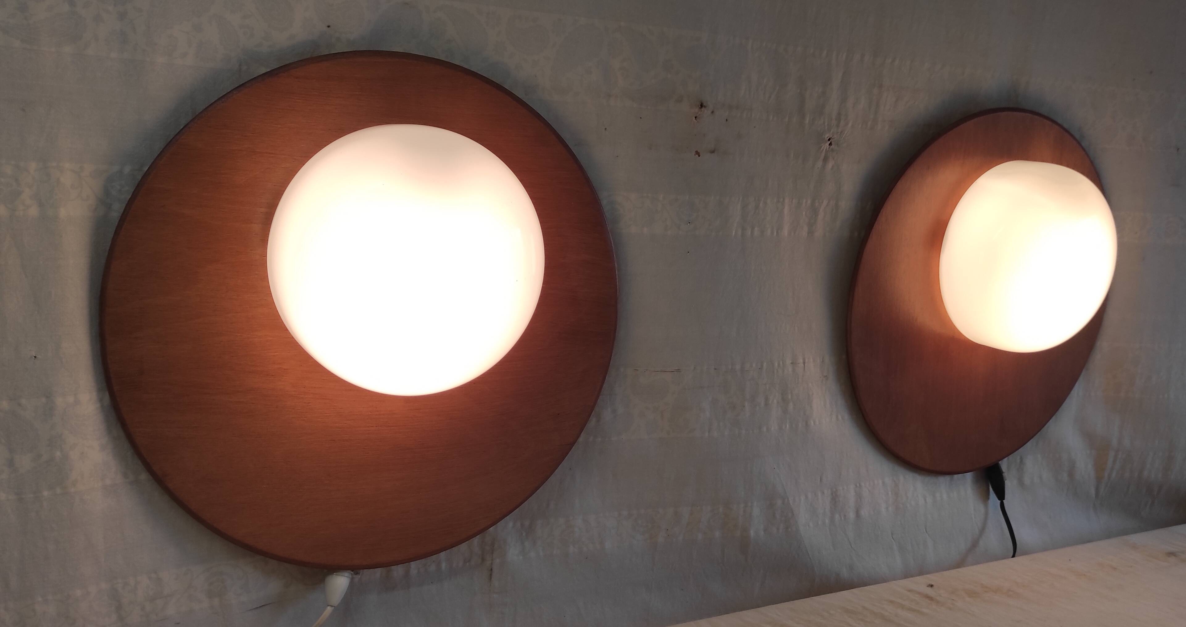 Globe-shaped wall sconces in opaline glass and wood - mid-20th century