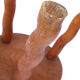 Tripod stool of folk art in light wood and wavy feet