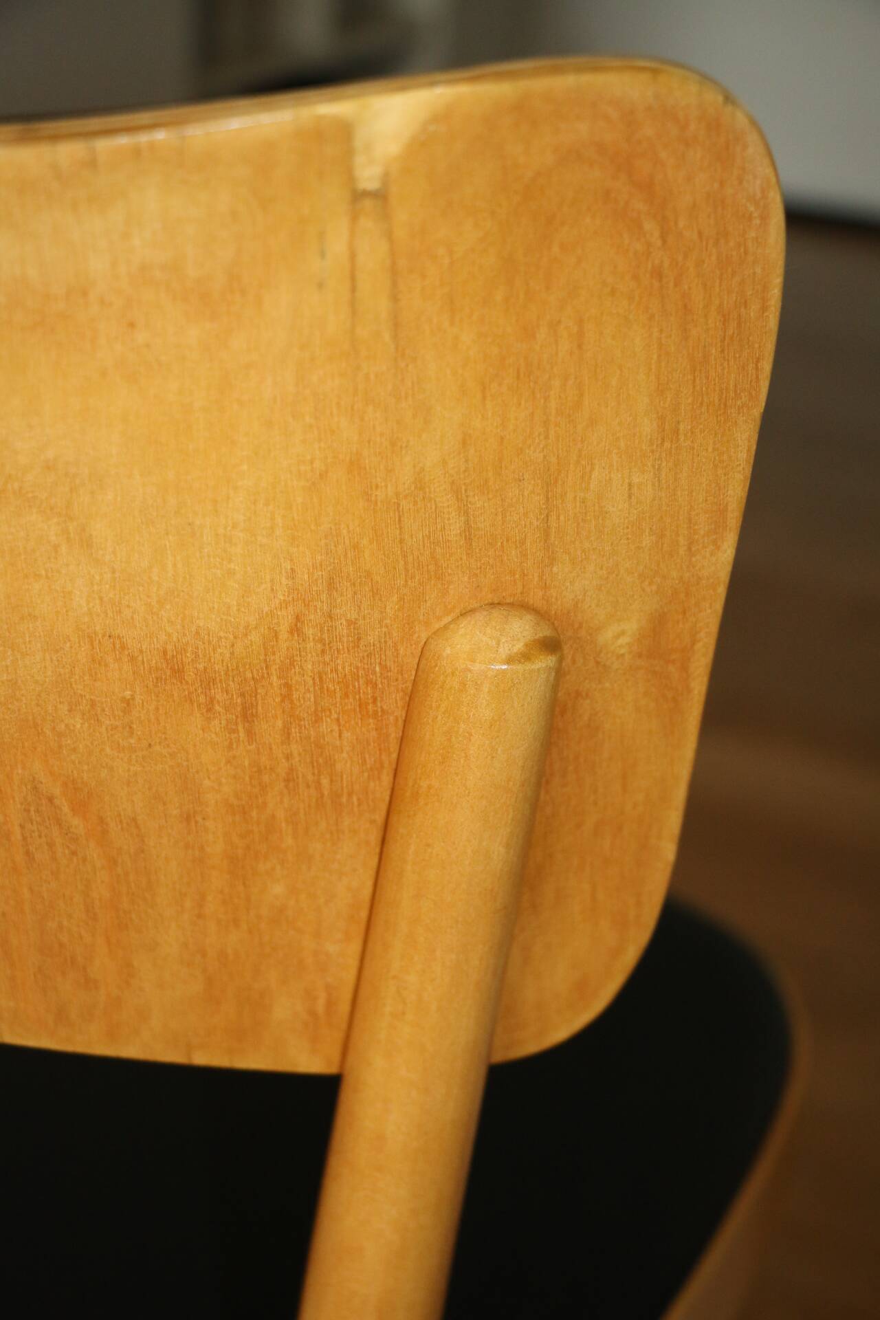 5 baumann chairs with large backs in black faux leather.