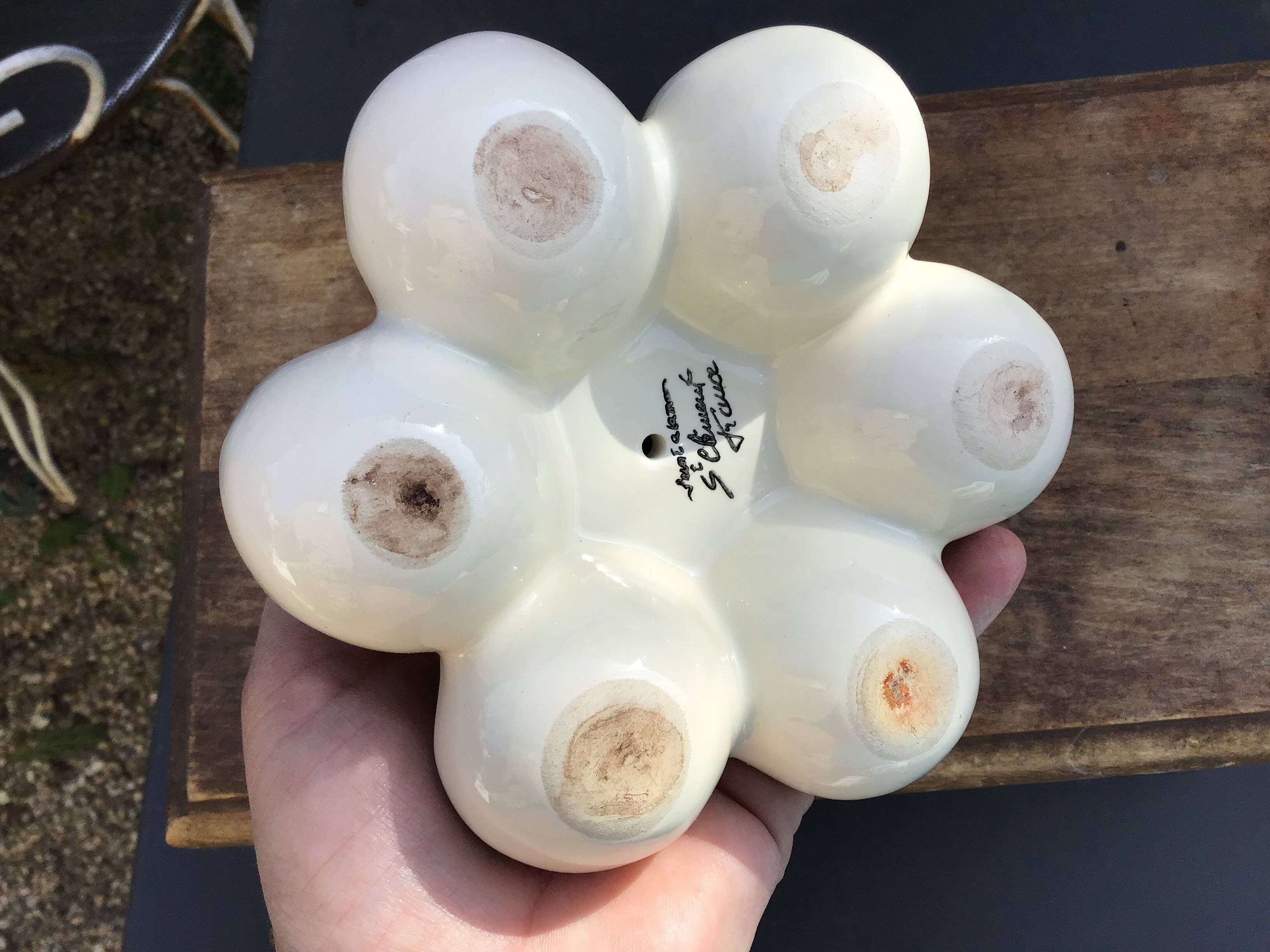 Egg cup with central chick decoration