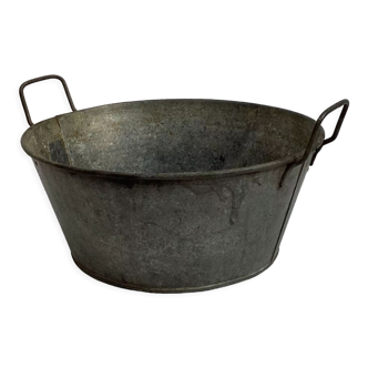 Old zinc basin with two handles