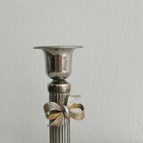 Patinated metal candle holder with knot