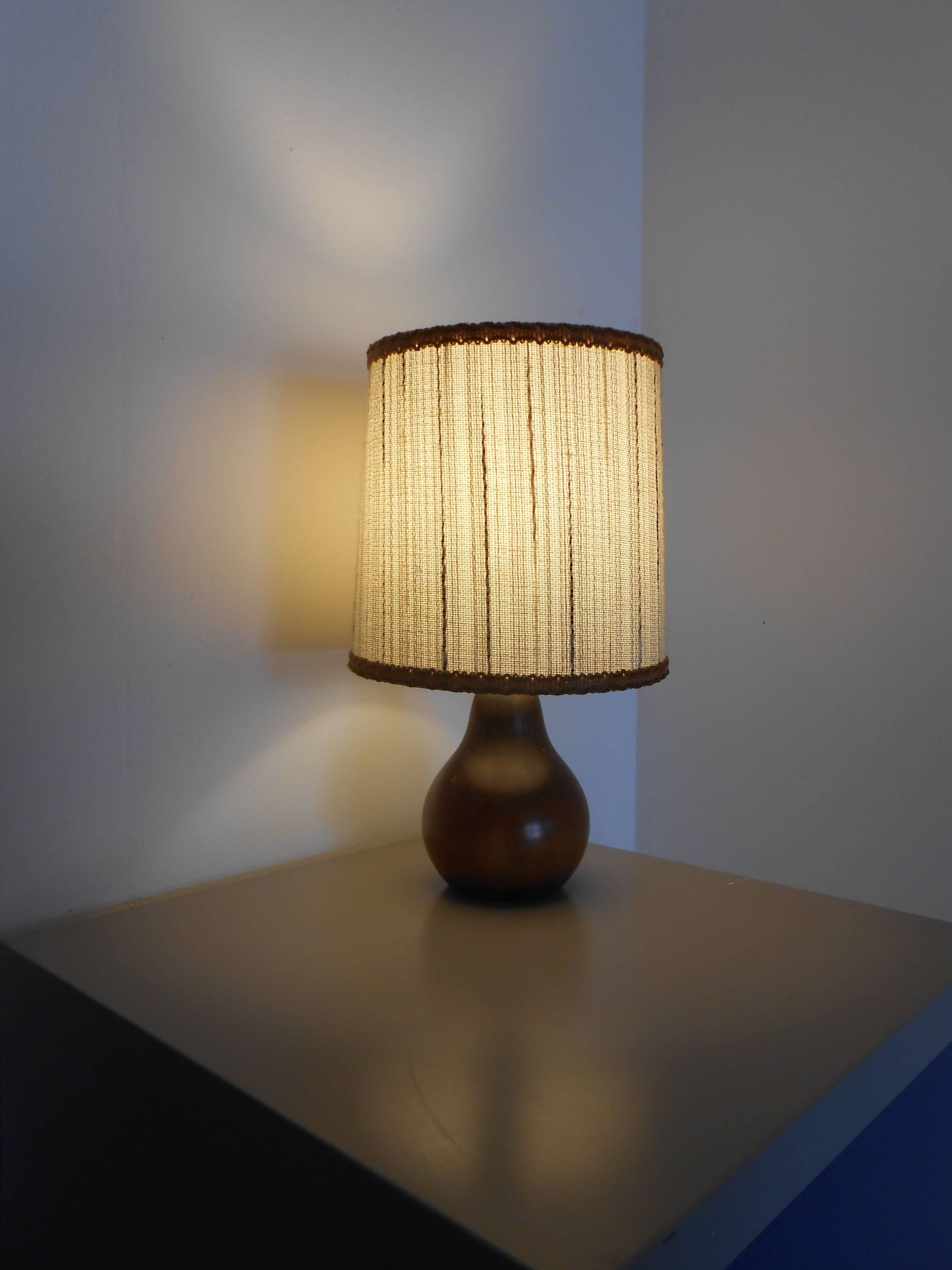 Carved wood lamp and wool yarn lampshade