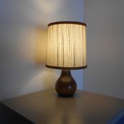 Carved wood lamp and wool yarn lampshade