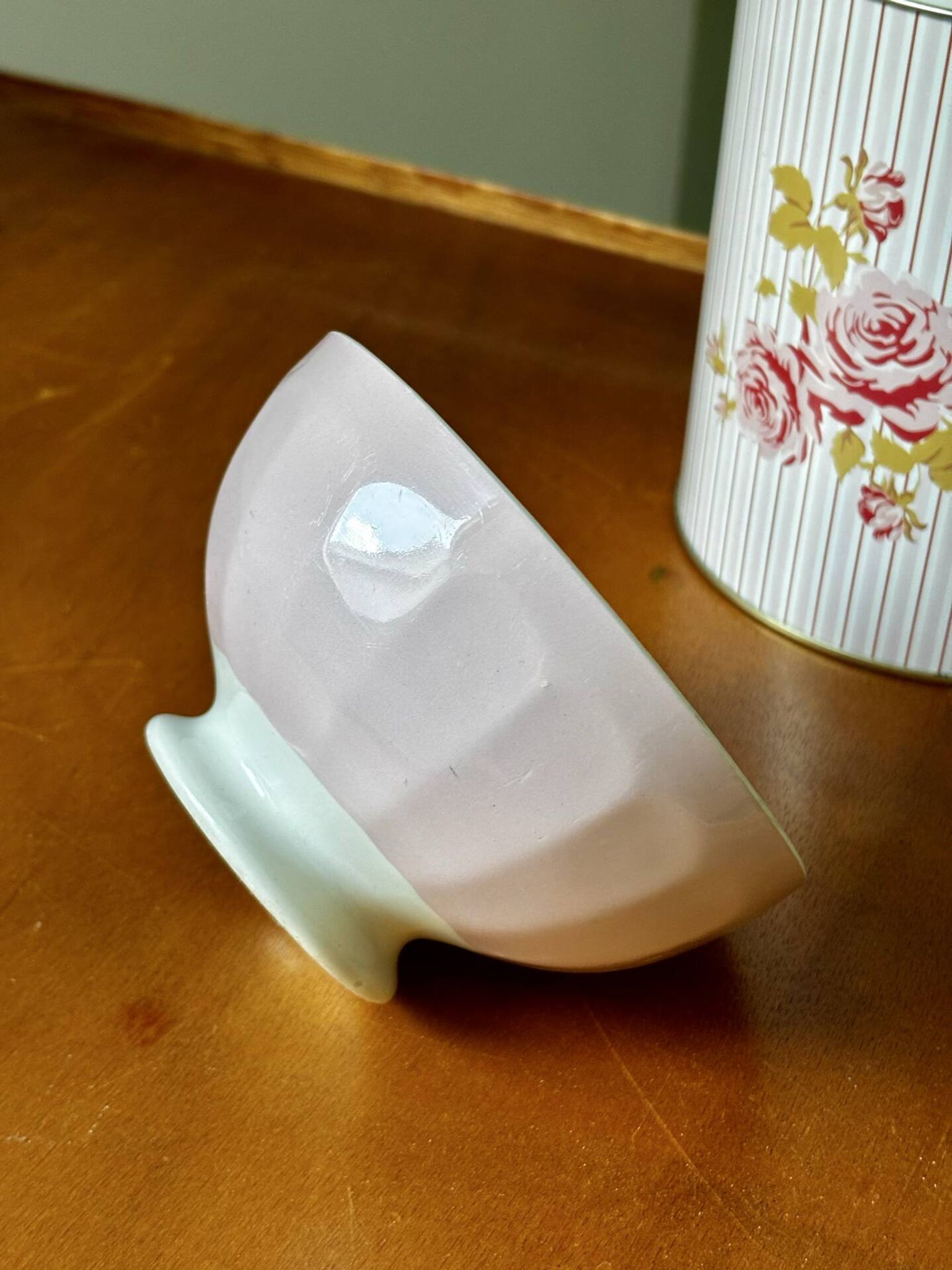Old faceted bowl in pink earthenware