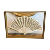 Mother-of-pearl fan and embroidered textile by Claude de Muzac – under frame