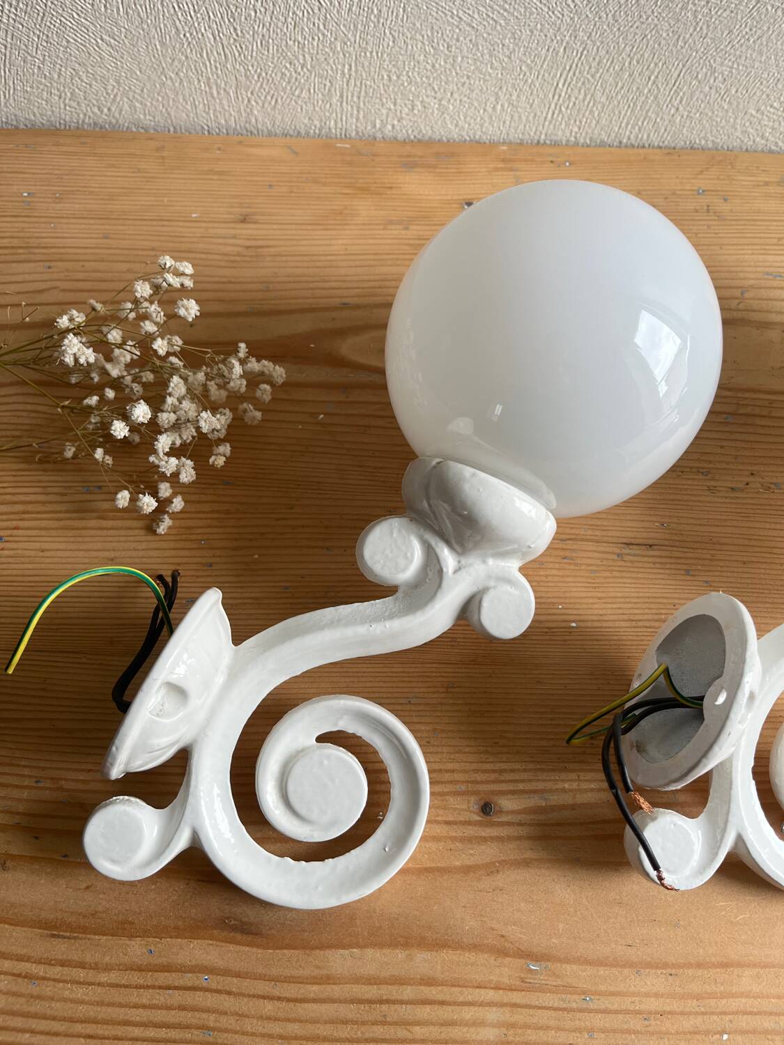 Antique enamelled cast iron wall lights / opaline globe