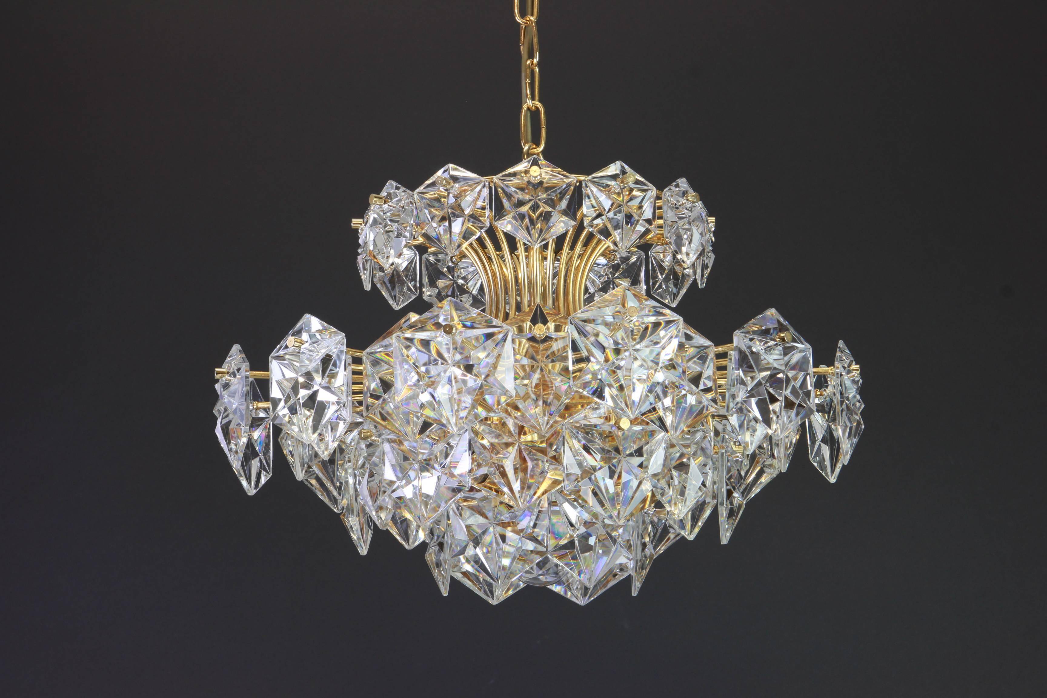 Chandelier in gilded brass and crystal glass by Kinkeldey, Germany, 1970s.