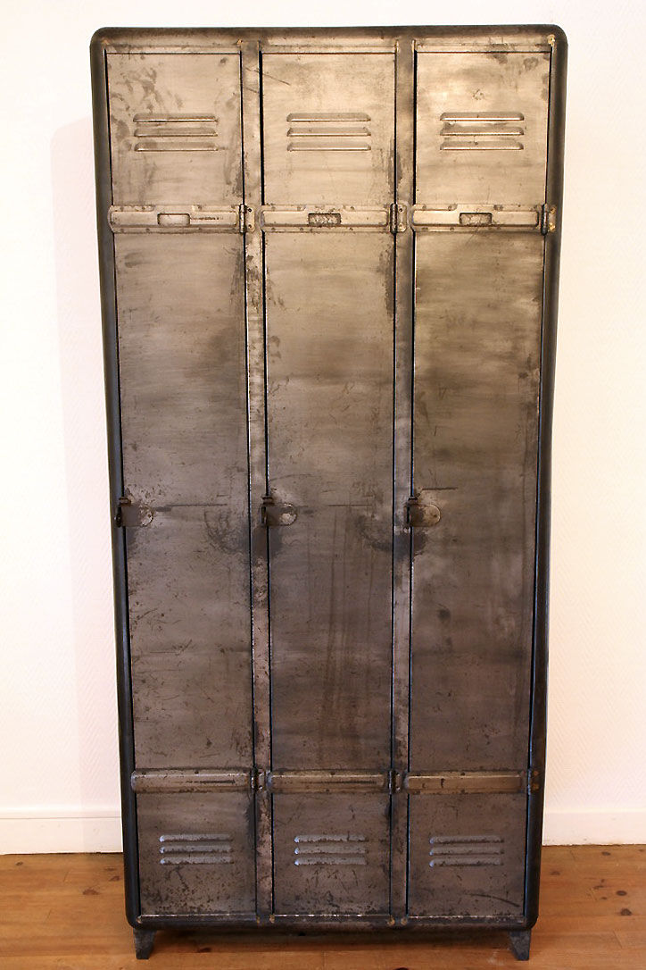 Industrial metal cloakroom with rounded corners.