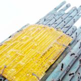 brutalist rough iron and glass wall sconce by Marcello Fantoni