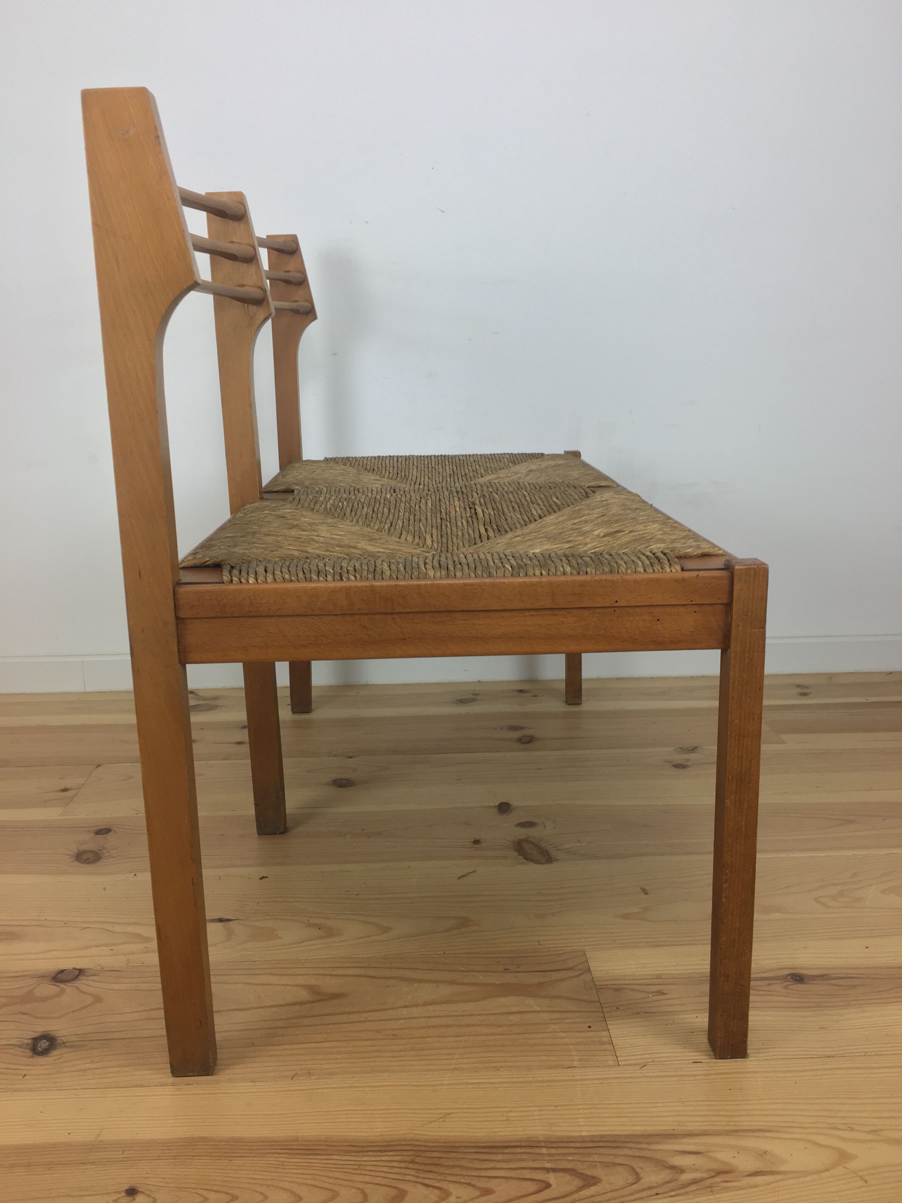 Wooden mulched modernist bench in 1950s