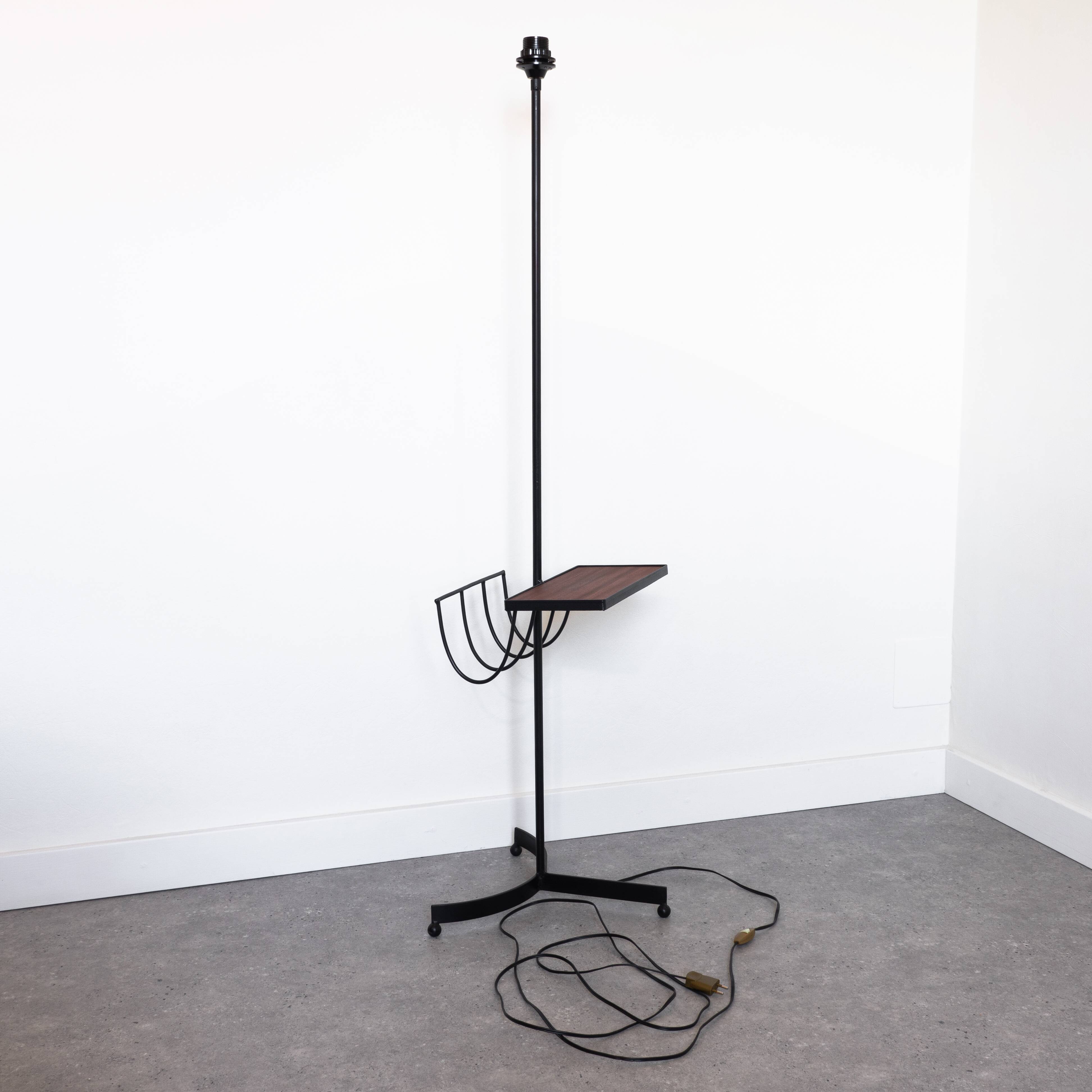 Black metal magazine rack floor lamp with ceramic shelf