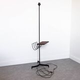 Black metal magazine rack floor lamp with ceramic shelf