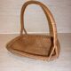 Flat diamond-shaped rattan basket with handle
