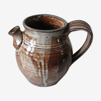 Old broc pitcher in terracotta signed and dated 87