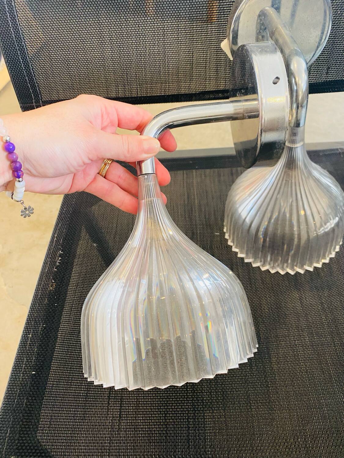 Many Kartell wall lamps.