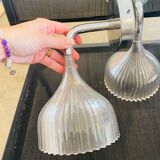 Many Kartell wall lamps.