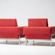 Red Kiushu armchairs by Saporiti characteristic of mid-20th century Italian modern design.