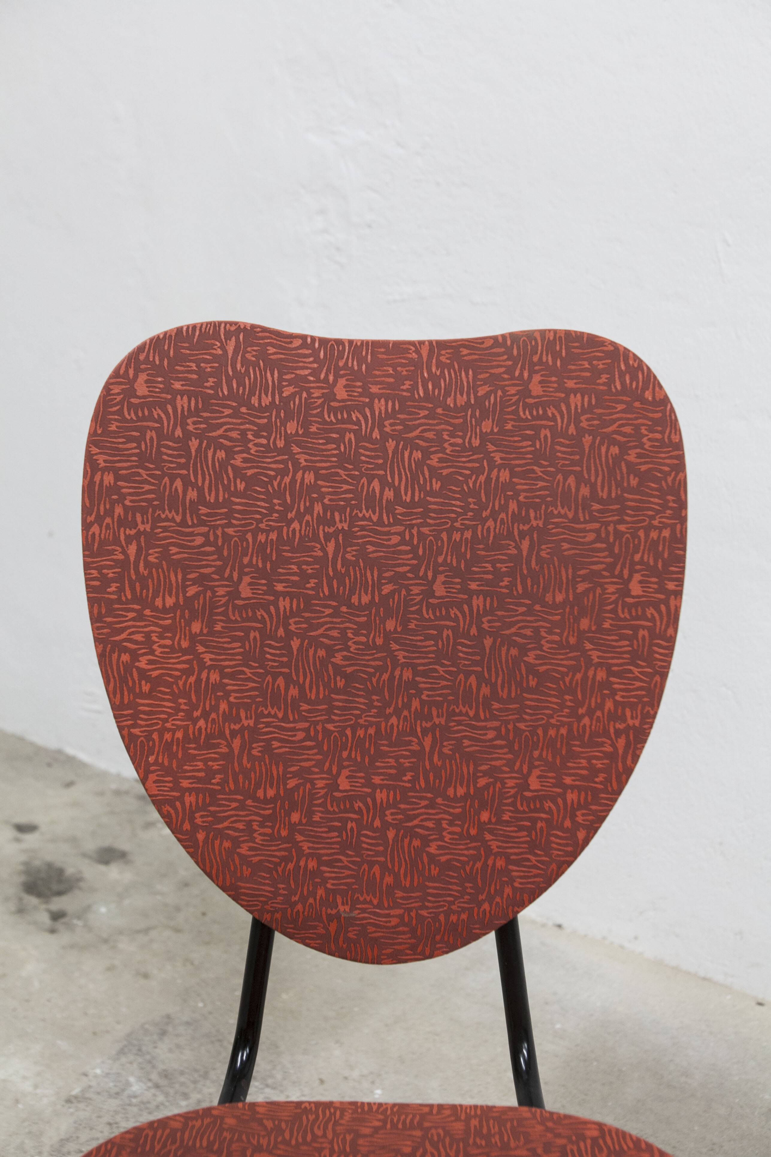 Vintage 70s chair in black lacquered metal and atypical red vinyl