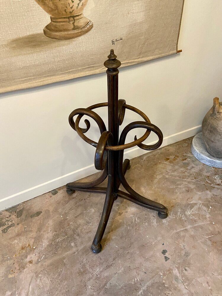 Umbrella holder in arched and dark wood