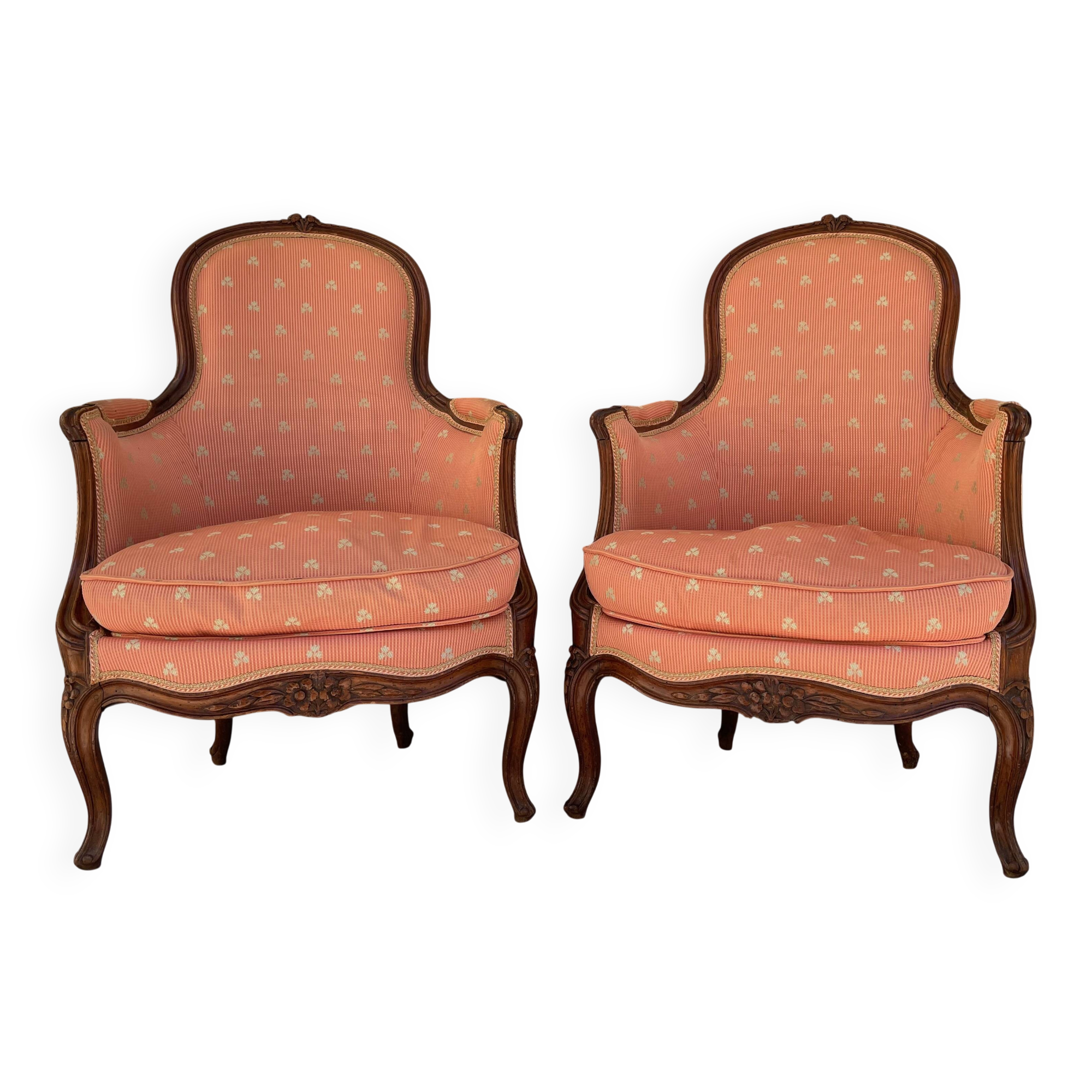 Pair of Louis XV period bergeres in walnut