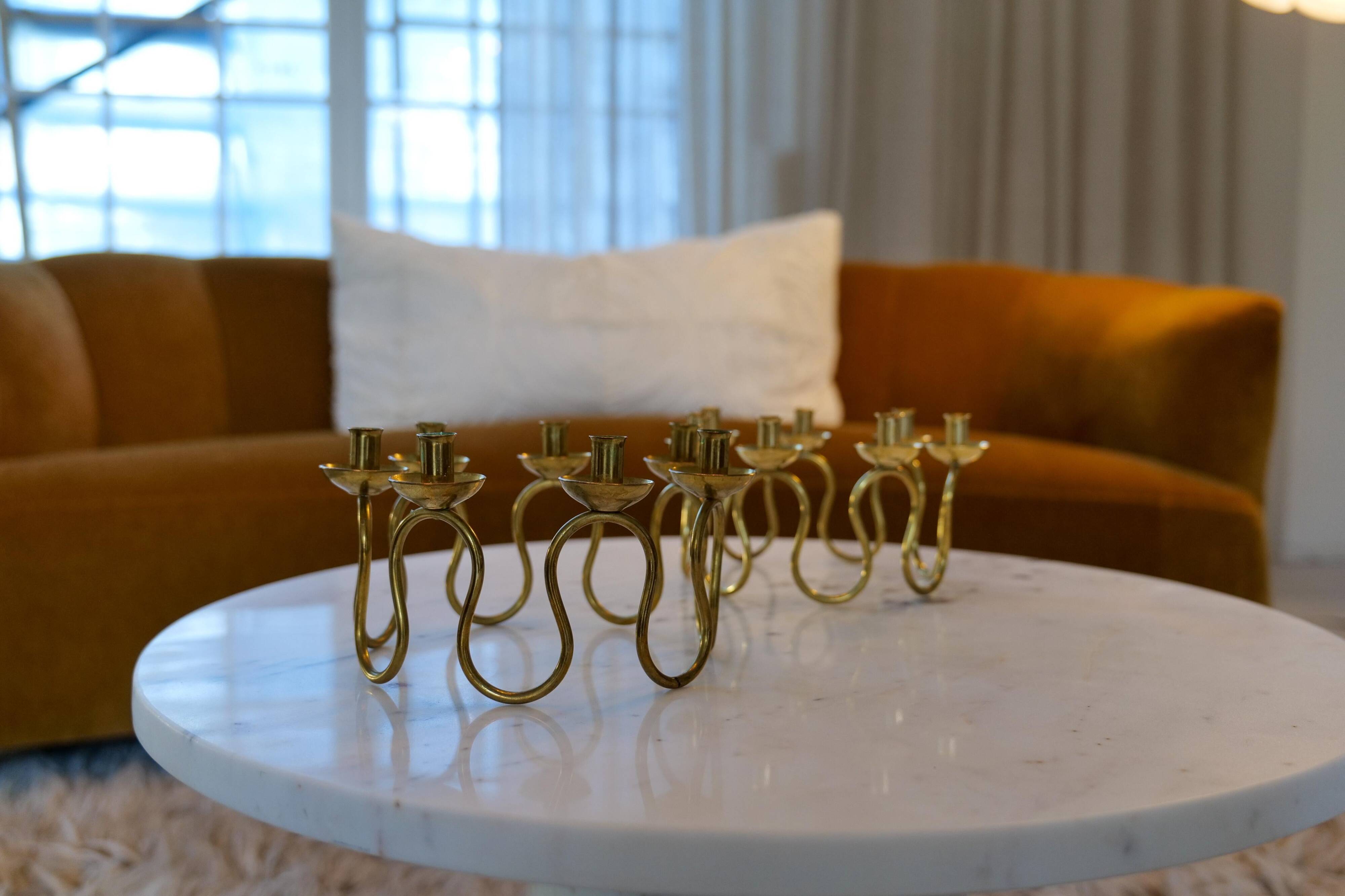 Art Deco brass chandeliers by Lars Holmström in Arvika, Sweden.