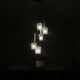 Large cascading chandelier with 5 glass lampshades and aluminium tube.