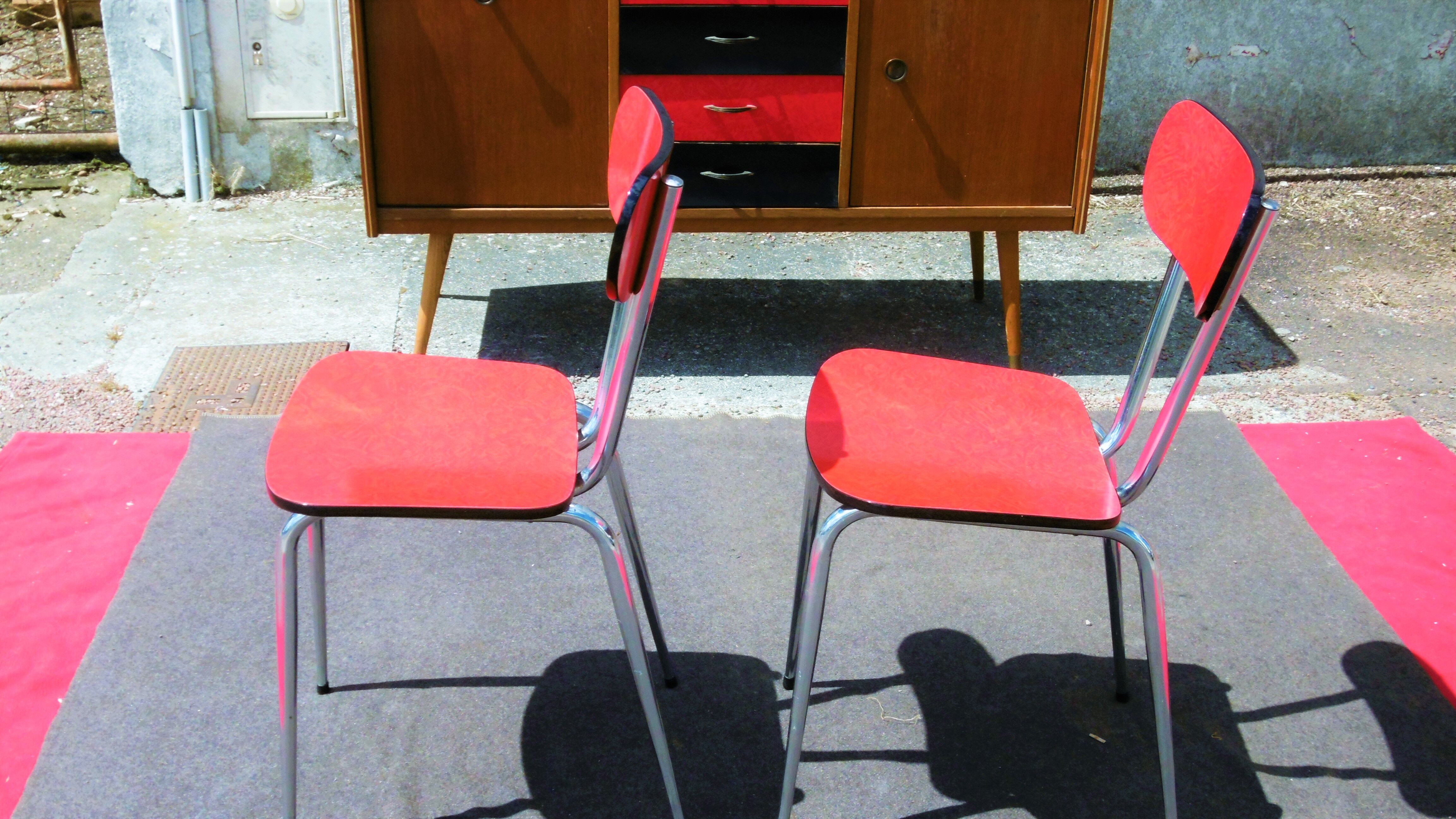 Red formica table and two chairs