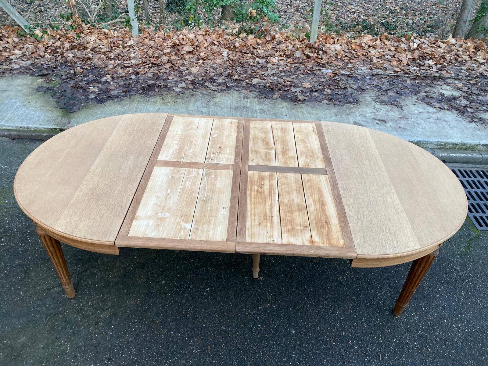 Renovated round Art Deco dining table in solid oak, 1950, 230cm extendable.