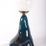 Blue ceramic sea lion lamp