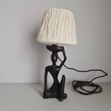 Ebony lamp with seated woman / 1930s