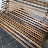 Old cast iron garden bench with oak slats