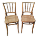 Set of 2 antique bistro chairs. Curved and turned wood.