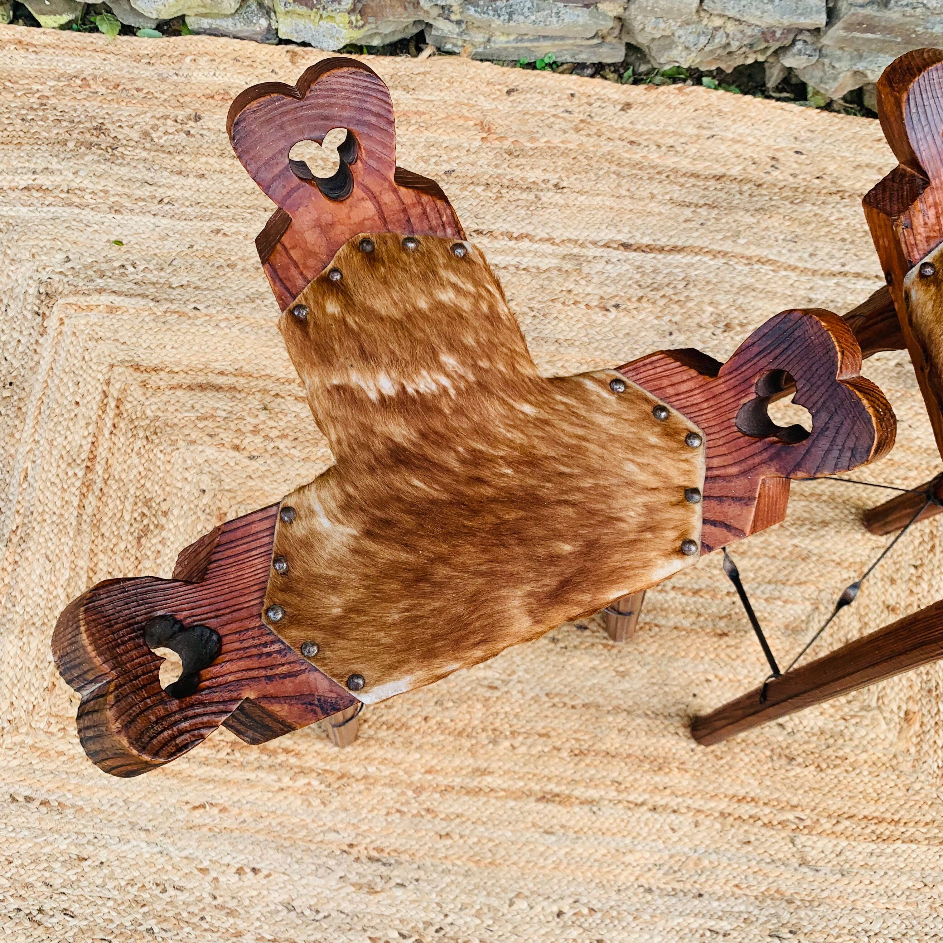 Set of 2 vintage high stools in cowhide and wood