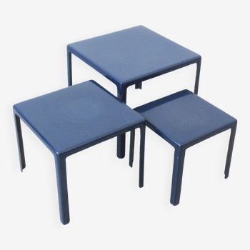 Three blue fiberglass nesting tables from the 1970s