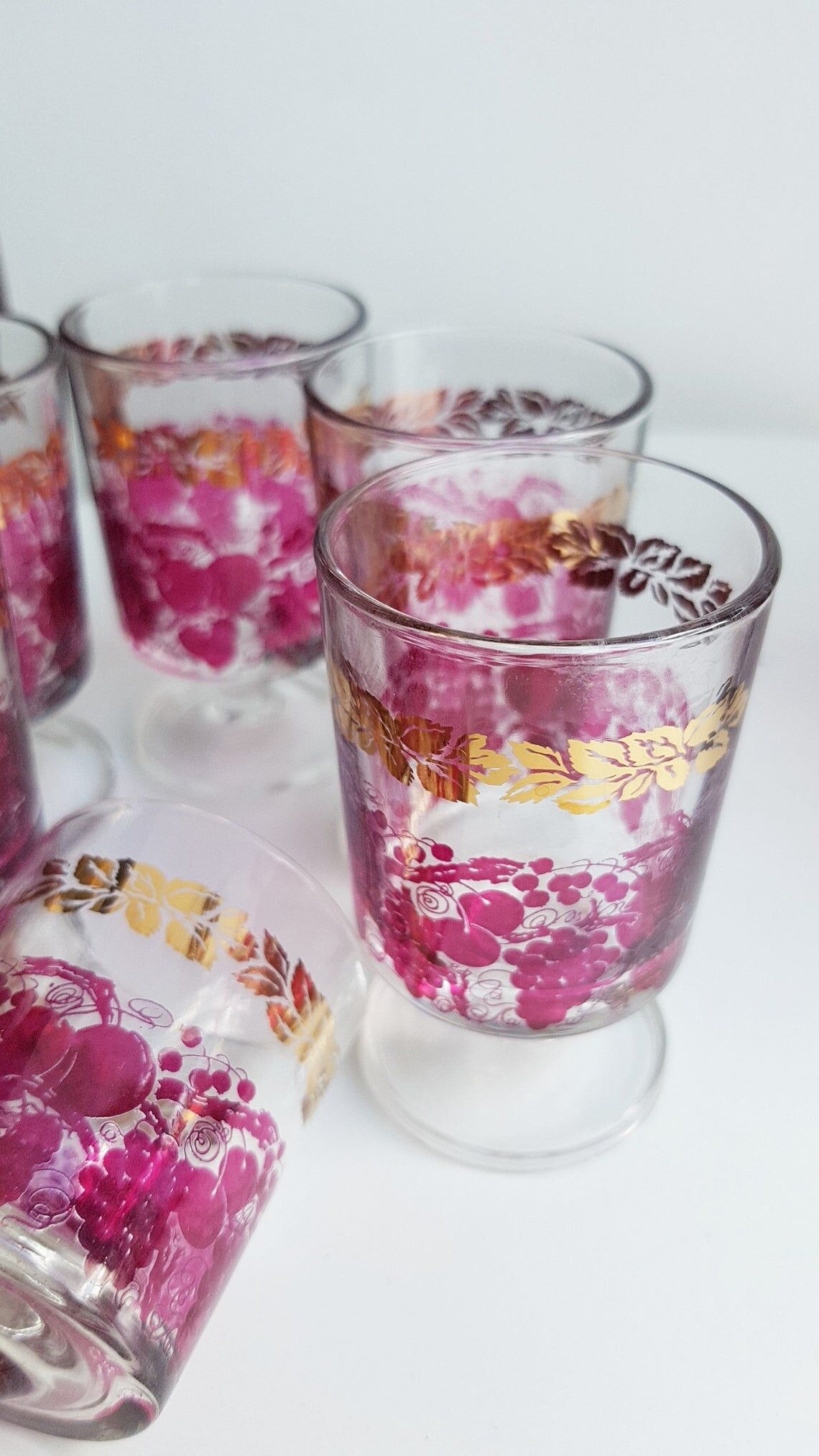 Pink and gilded glass liquor service