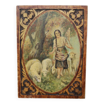 Old oil on wooden panel, carved contours